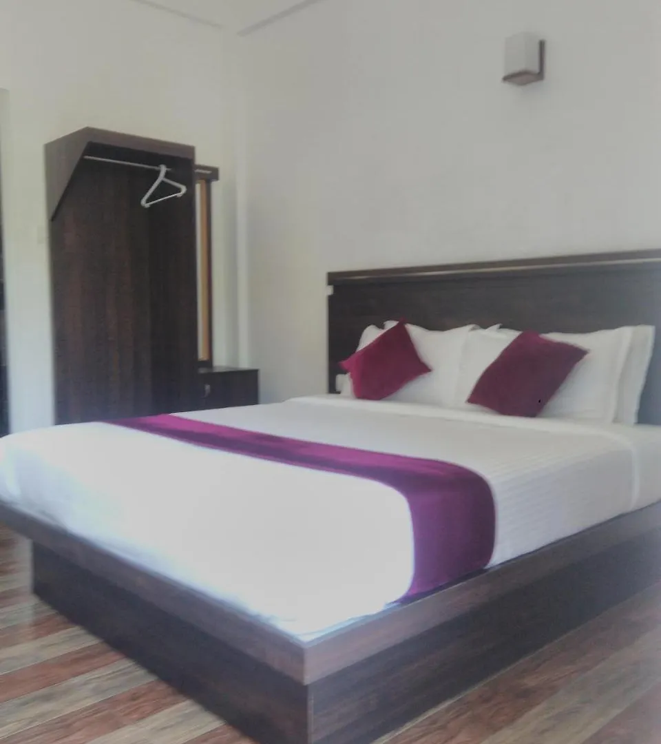 Couette-café Landy Queen Munnar